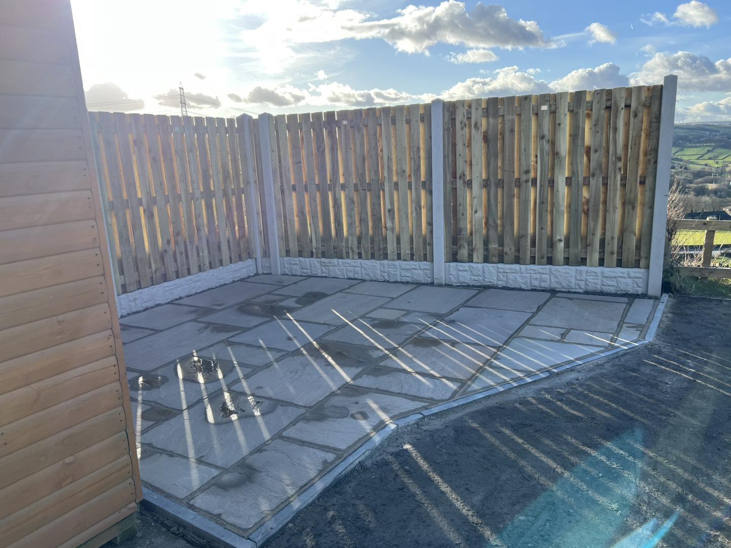 Fencing with stone patio